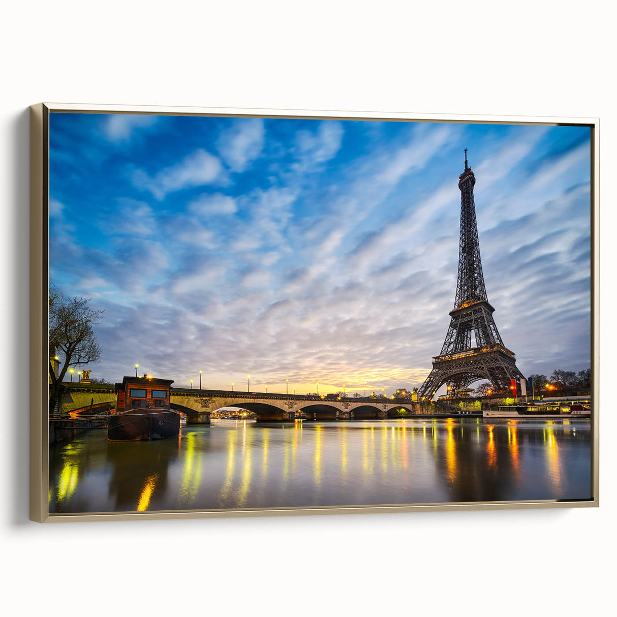 Framed canvas of a vintage Paris landscape in black and gold tones, ideal for bedroom wall art.