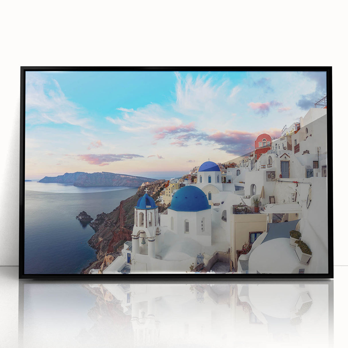 Large abstract wall art depicting the Santorini landscape in muted blue and white tones on a framed acrylic.