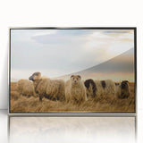 Large art print of a serene Iceland landscape in soft blues and grays, framed in silver acrylic.