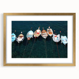 Abstract art print of Cinque Terre with vibrant coastal hues on a framed gold mat, ideal for dining room decor.