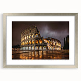 Extra large wall art depicting the Colosseum in muted earth tones on a silver-framed canvas, ideal for living room decor.