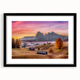 Colorful abstract art print of the Dolomites in Italy, presented in a black frame with mat, ideal for living room decor.