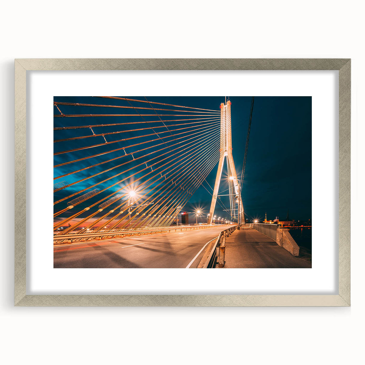 Extra large abstract art print of a textured European landscape in muted earth tones, framed in silver.