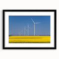 Abstract art print of a colorful, textured European scenery on a large framed canvas, ideal for living room decor.