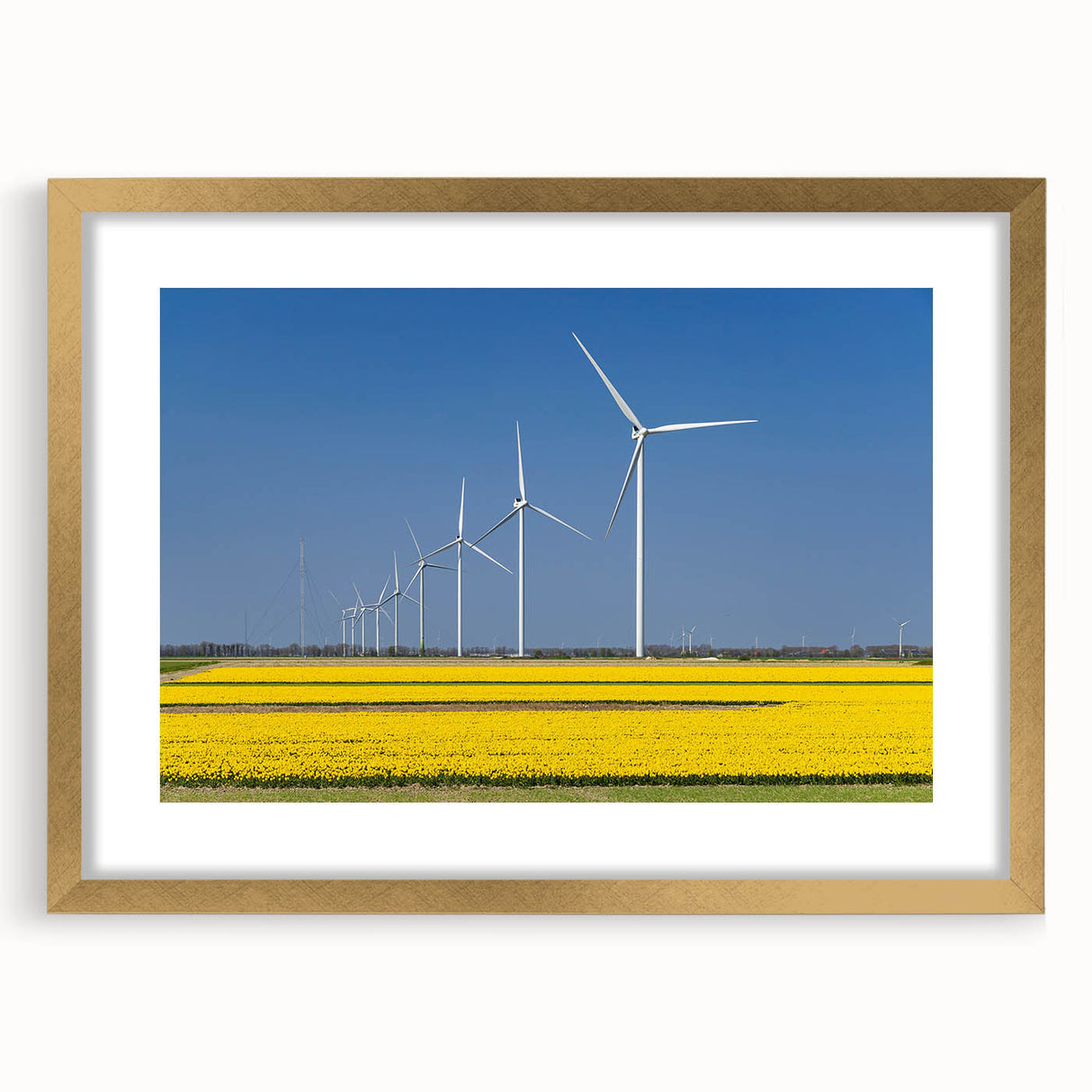 Abstract art print of a European scenery in muted earth tones on a gold-framed mat, suitable for dining room decor.