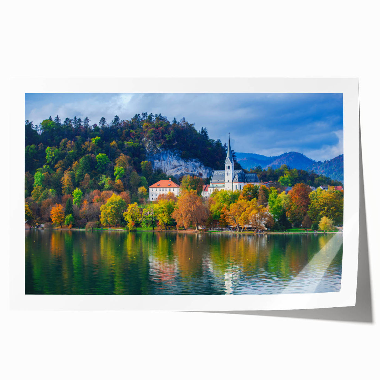 Extra large rolled canvas print of a Slovenian landscape with vibrant green fields and a distant mountain range.