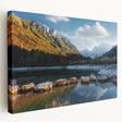 Scenic Swiss landscape on stretched canvas, featuring lush green fields and distant mountains, in muted earth tones.