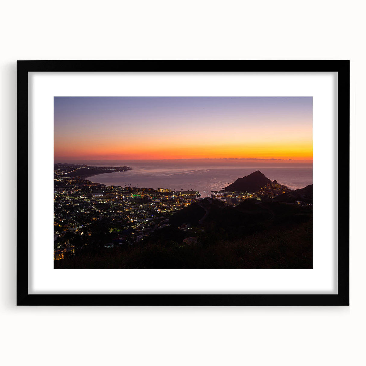 Extra large framed wall art depicting an abstract colorful scene of Cabo San Lucas with textured print.
