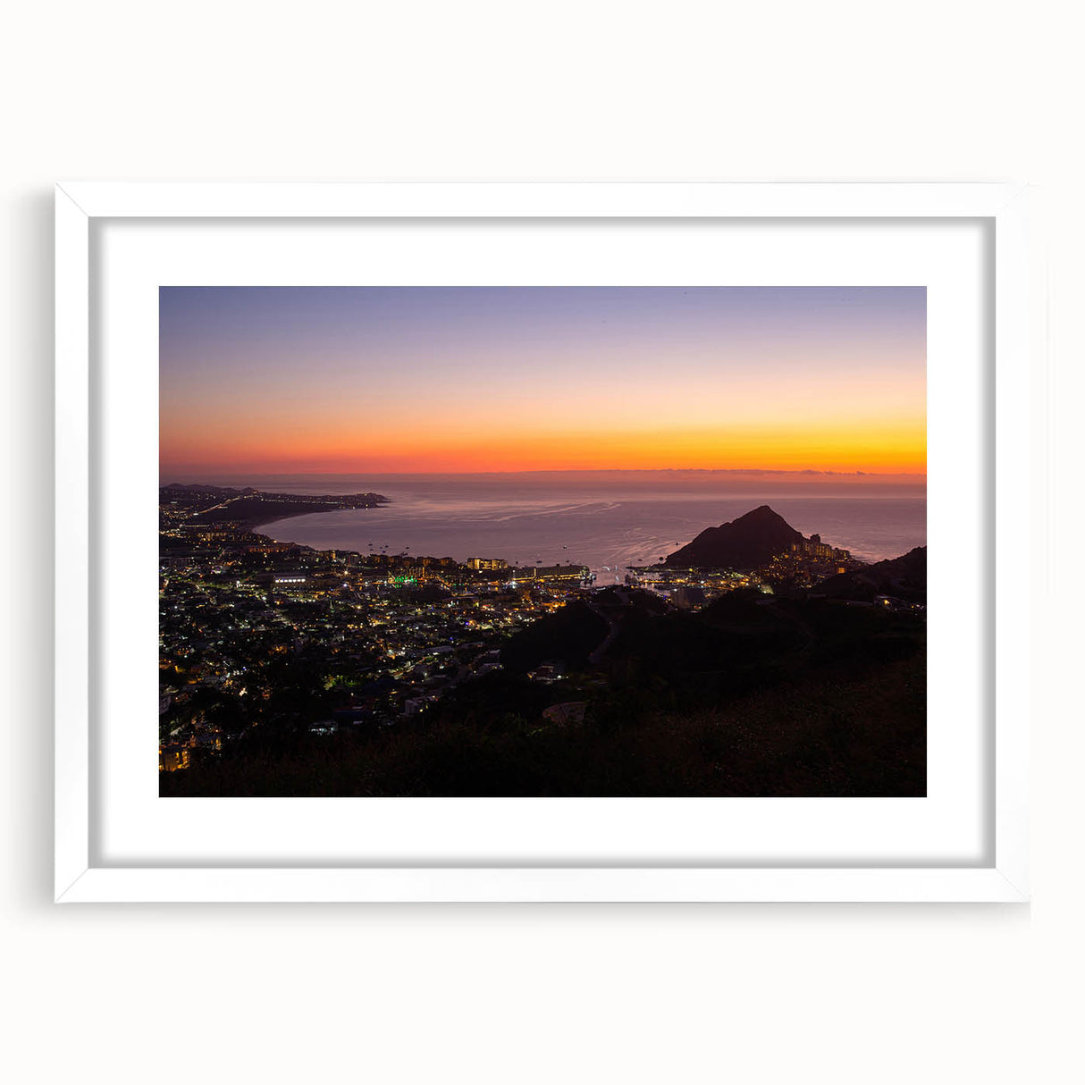 Abstract art print of Cabo San Lucas scenery in muted blue and green tones on a white-framed mat.