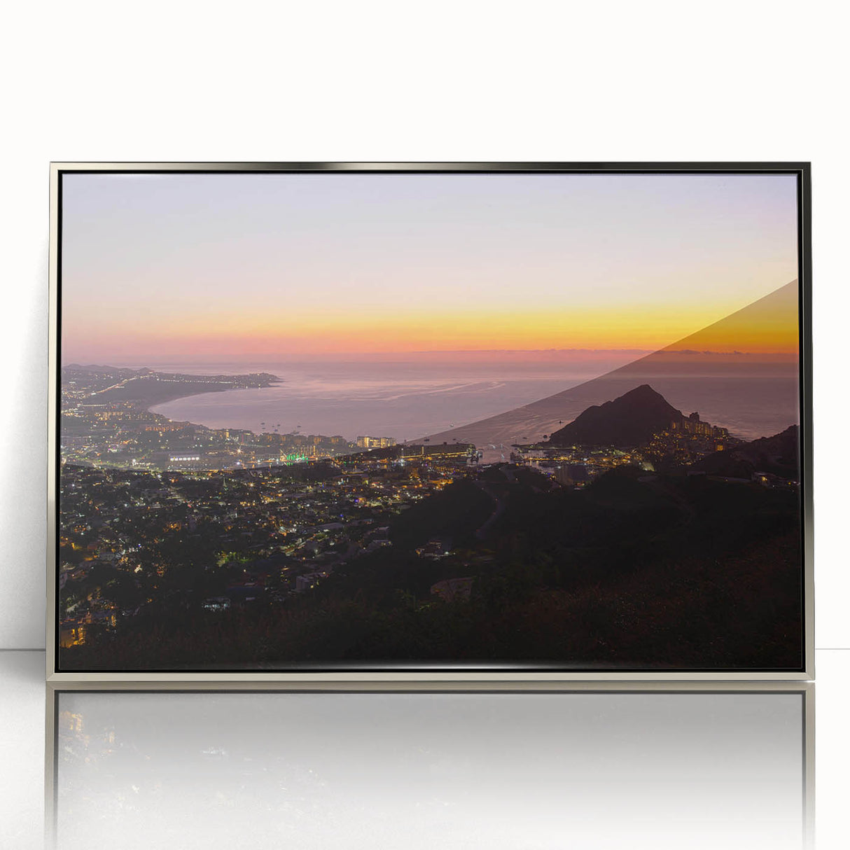 Framed acrylic print of Cabo San Lucas scenery in mid-century modernist style with silver frame.