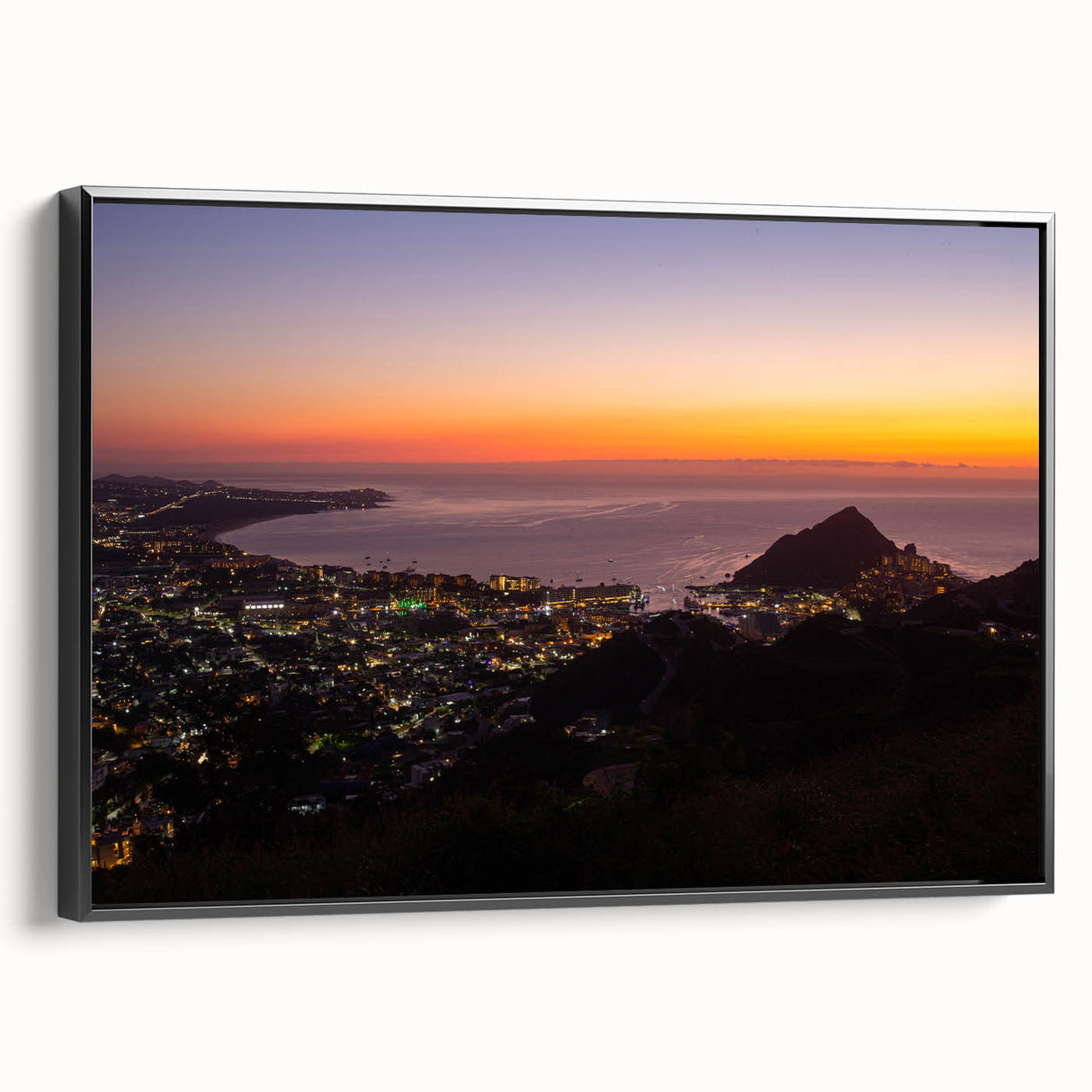 Black and white framed canvas of Cabo San Lucas landscape, ideal for bedroom wall decor.
