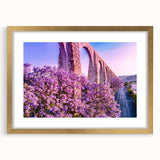 Extra large abstract art print of Guanajuato, Mexico, in gold frame, featuring textured, vibrant colors.