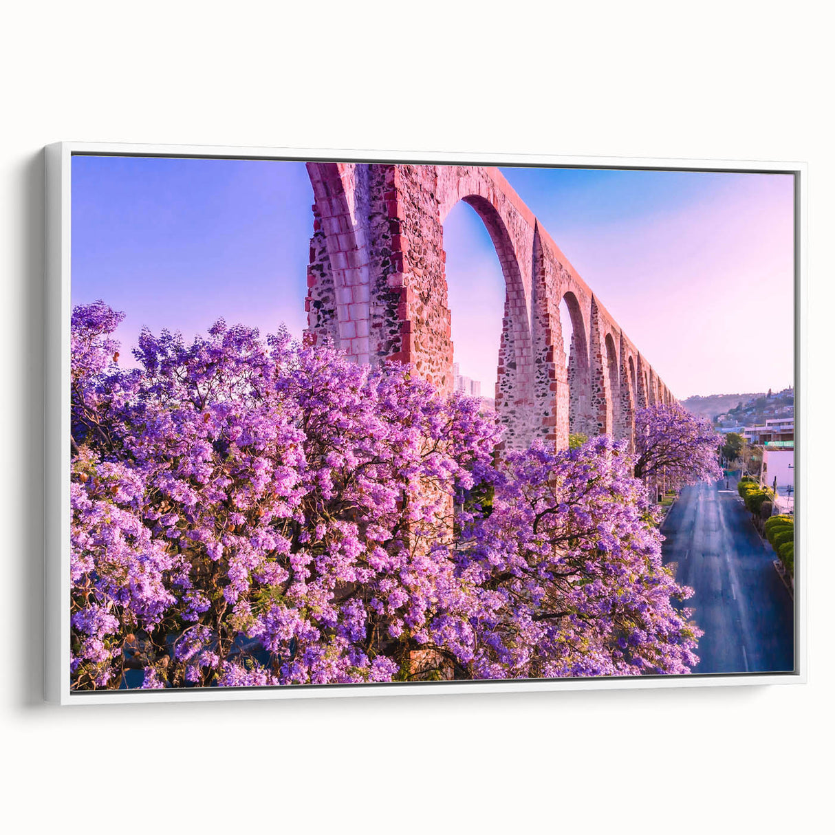 Vintage poster art of Guanajuato, Mexico, featuring colorful buildings on a framed canvas, ideal for living room decor.