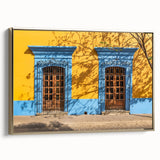Framed canvas featuring a vintage-style landscape painting of Oaxaca, Mexico, in muted gold and black.