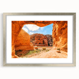 Textured abstract art print depicting Middle Eastern scenery in neutral tones, framed in silver, ideal for bedroom art.