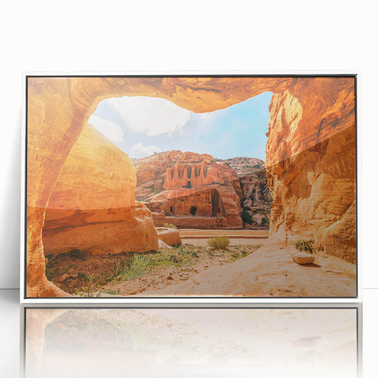 Acrylic print of Jordanian landscape in muted earth tones, framed in white, suitable for modern art wall decor.