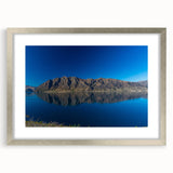 Textured art of abstract Otago, New Zealand scenery in silver frame, with muted earth tones, ideal for bedroom art.