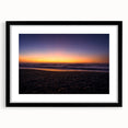 Extra large abstract art print of New Zealand's west coast in vibrant colors on a textured canvas, framed in black.