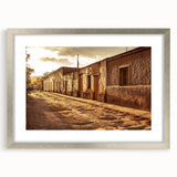 Textured art depicting abstract Santiago skyline in muted earth tones on a framed silver mat, suitable for bedroom decor.