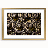 Extra large abstract art print of a textured Colombian landscape in vibrant earth tones, framed in gold.