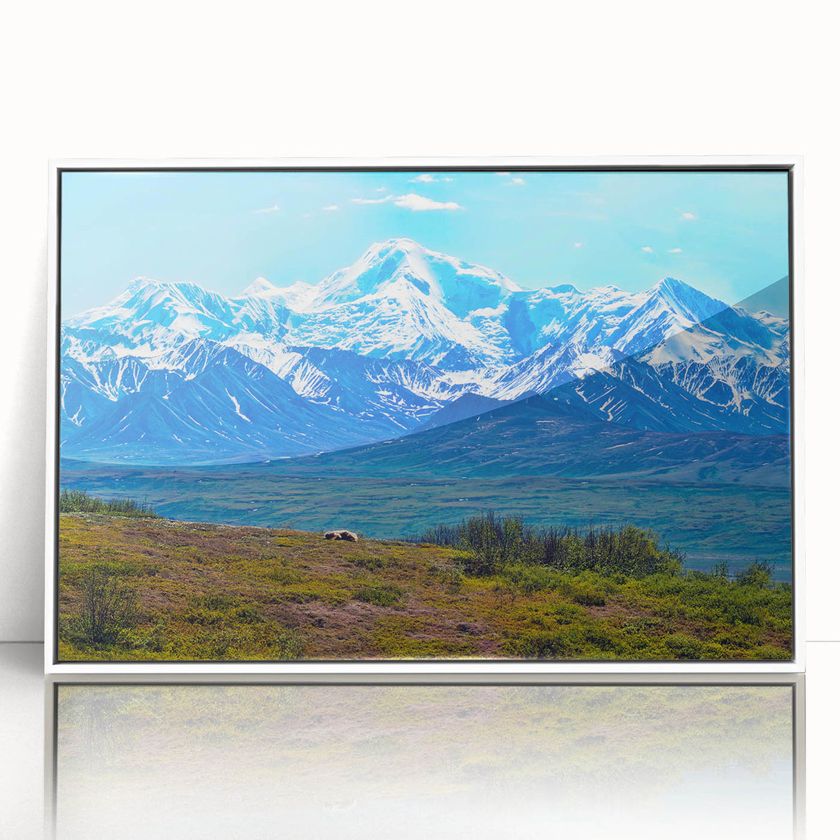 Art Deco style poster of Denali, Alaska, in muted earth tones on acrylic, framed in white, suitable for modern nursery decor.