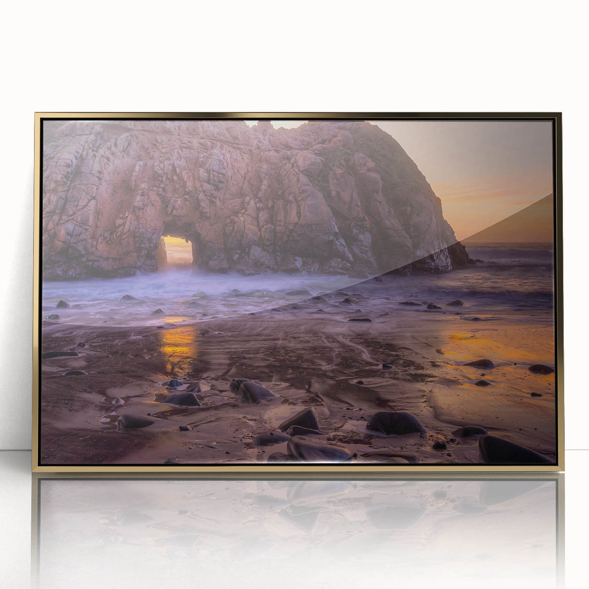 Large art print of Big Sur, California, in mid-century modernist style on gold-framed acrylic.