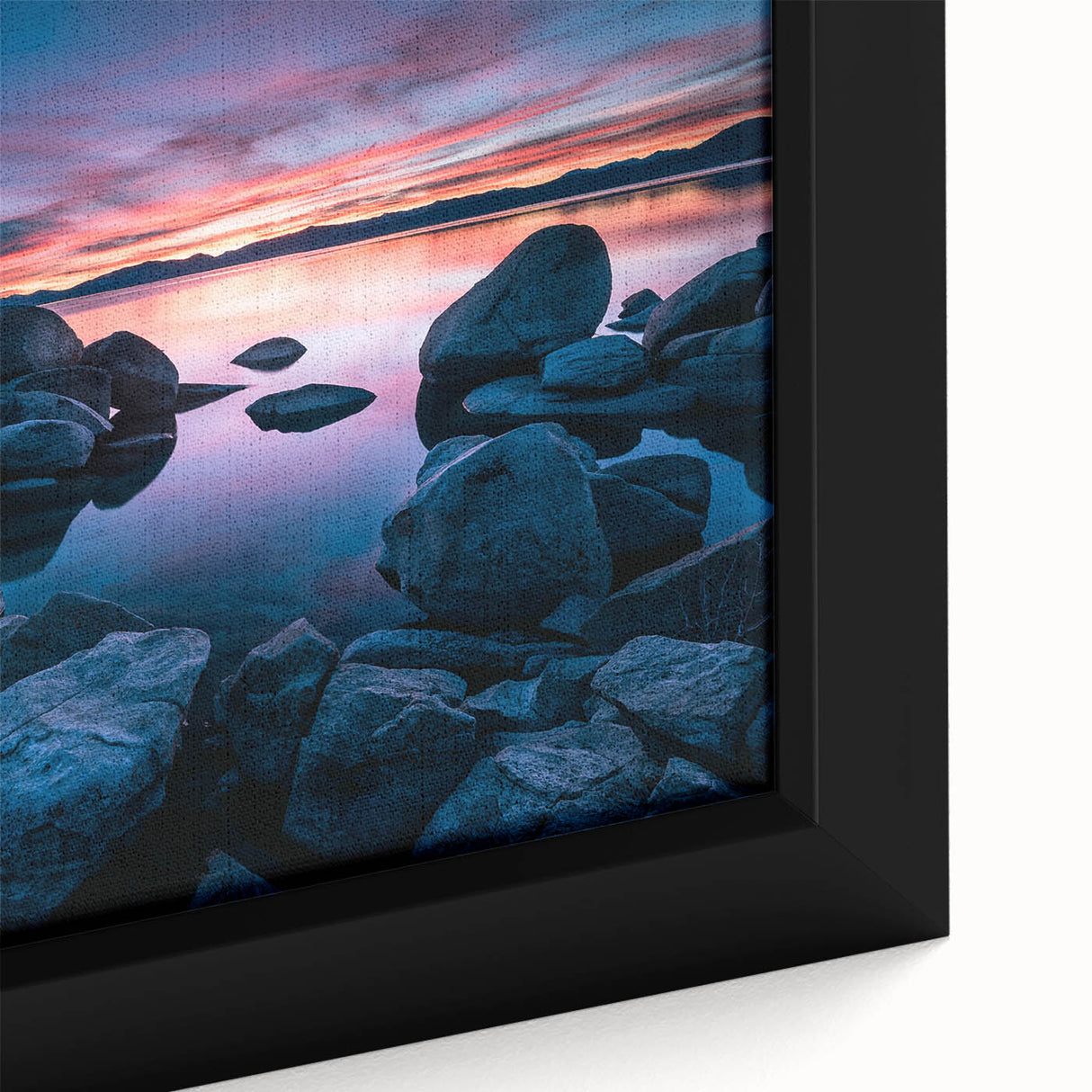 Framed canvas depicting Lake Tahoe surrounded by trees, featuring a textured mix of black and colorful hues.