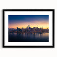 Extra large abstract art print of San Francisco skyline in vibrant, colorful tones on a black framed canvas.
