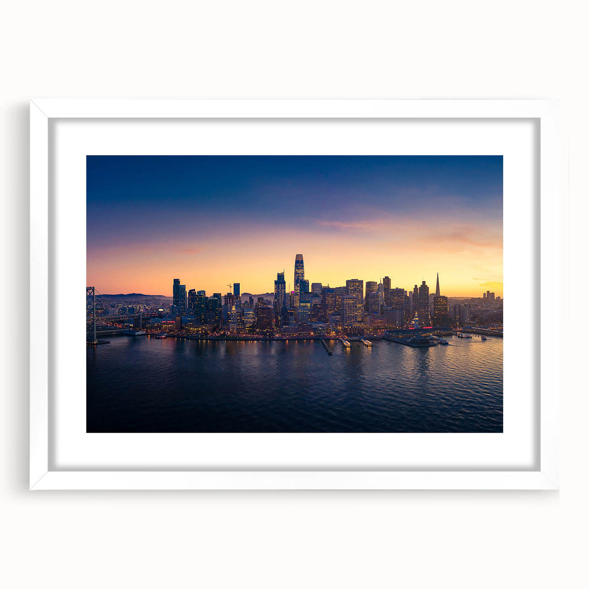 Abstract art print of San Francisco skyline in muted blue and gray tones on a framed white mat, ideal for dining room decor.