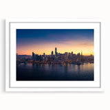 Abstract art print of San Francisco skyline in muted blue and gray tones on a framed white mat, ideal for dining room decor.
