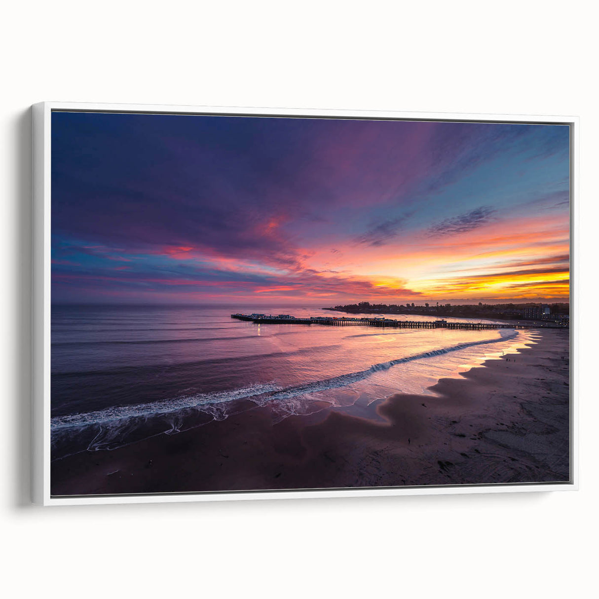Vintage poster art of Santa Cruz with vibrant colors on a white framed canvas, ideal for living room decor.