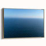 Framed canvas showing a vintage-style landscape of Santa Monica with muted gold and black tones.