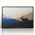 Large abstract wall art depicting the Rocky Mountains in muted earth tones, framed in black acrylic.