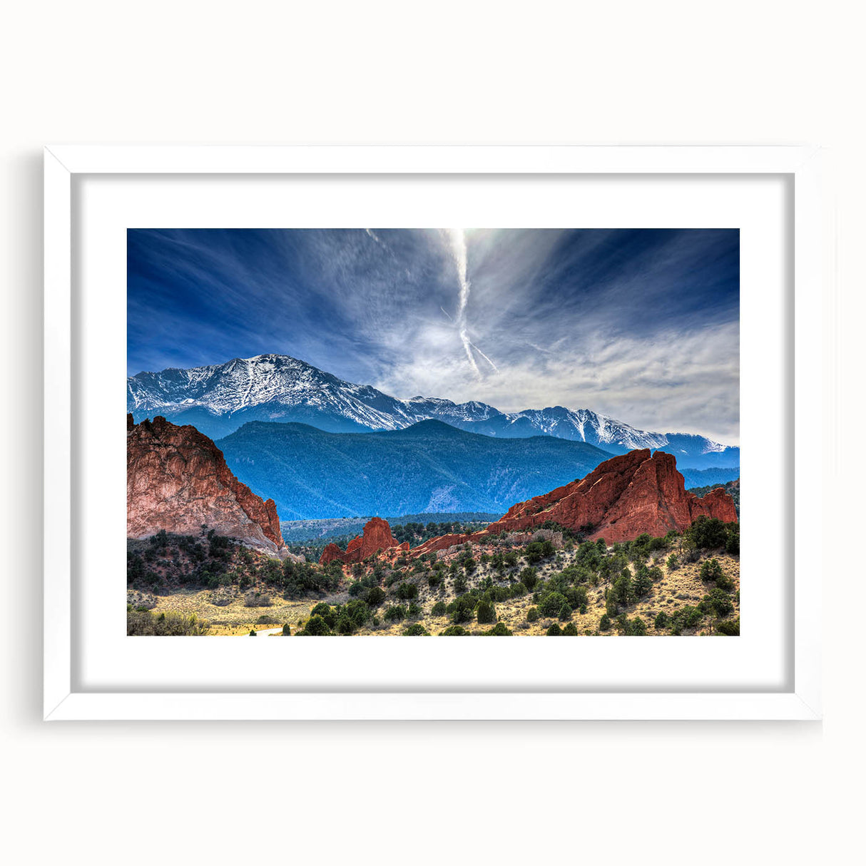 Abstract art print of Colorado Springs in muted earth tones on a white-framed canvas, suitable for dining room decor.
