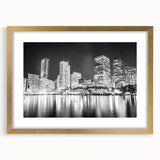 Extra large abstract art print depicting a textured Miami skyline in muted gold tones, framed with a mat.