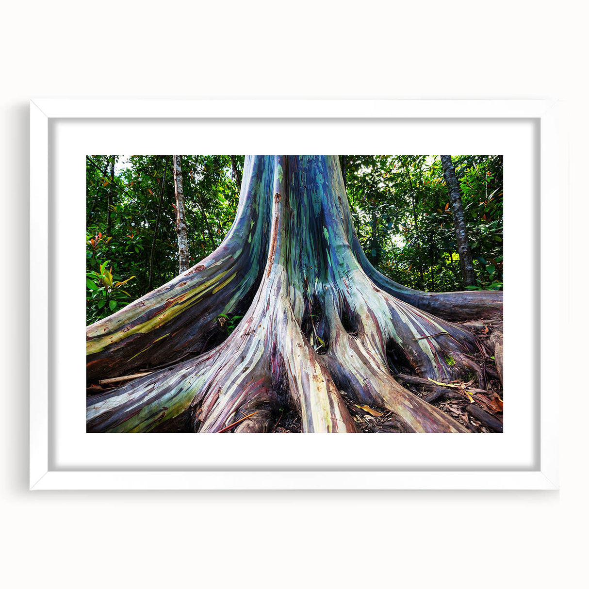 Abstract art print of a Maui landscape in muted blue and green tones on a framed white mat, ideal for dining room decor.