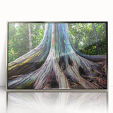 Mid-century modernist art depicting a serene Maui landscape in muted blues and greens, framed in silver acrylic.
