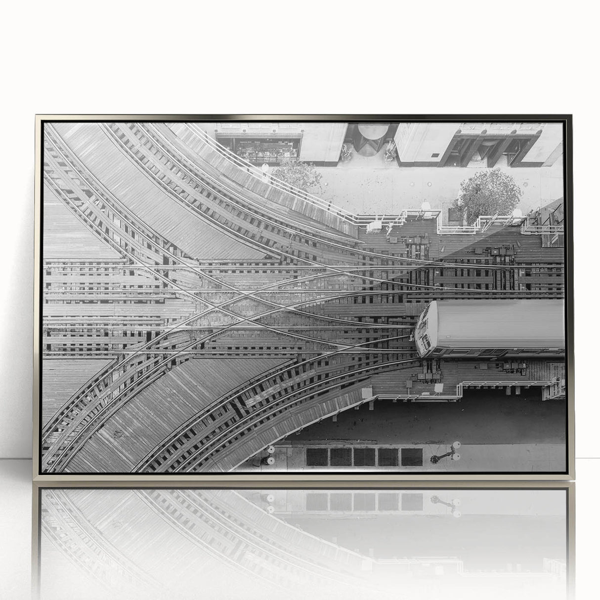 Mid-century modernist art depicting the Chicago skyline in silver and gray tones on a framed acrylic print.