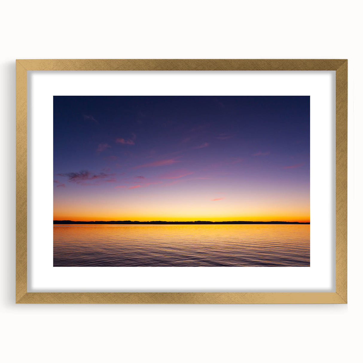 Extra large abstract art print of Lake Michigan, with textured waves in muted blue tones, framed in gold.