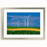 Textured abstract art print of Iowa scenery in muted earth tones, framed in silver, suitable for bedroom decor.