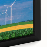 Close-up of a textured black wall art depicting Iowa scenery on framed canvas, featuring vibrant color accents.