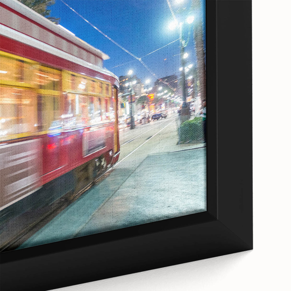Close-up of a textured black wall art depicting a colorful New Orleans scenery on a framed canvas.