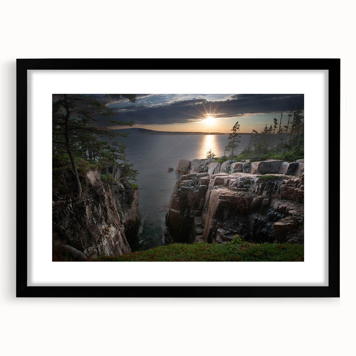 Colorful abstract art print of Acadia, featuring vibrant hues on textured canvas, framed in black.