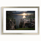 Textured abstract art print depicting Acadia's rugged coastline in muted blue and gray tones, framed in silver.