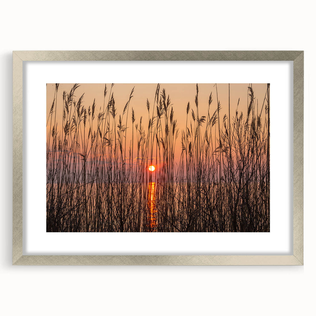 Textured abstract art print of Chesapeake Bay in muted blue and gray tones on a silver-framed mat, ideal for bedroom decor.