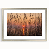 Textured abstract art print of Chesapeake Bay in muted blue and gray tones on a silver-framed mat, ideal for bedroom decor.