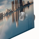 Large abstract depiction of Detroit skyline in muted gray and blue tones on acrylic glass, ideal for dining room art.