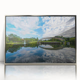Mid-century modernist art depicting the Charlotte skyline in cool blue tones, printed on framed acrylic.