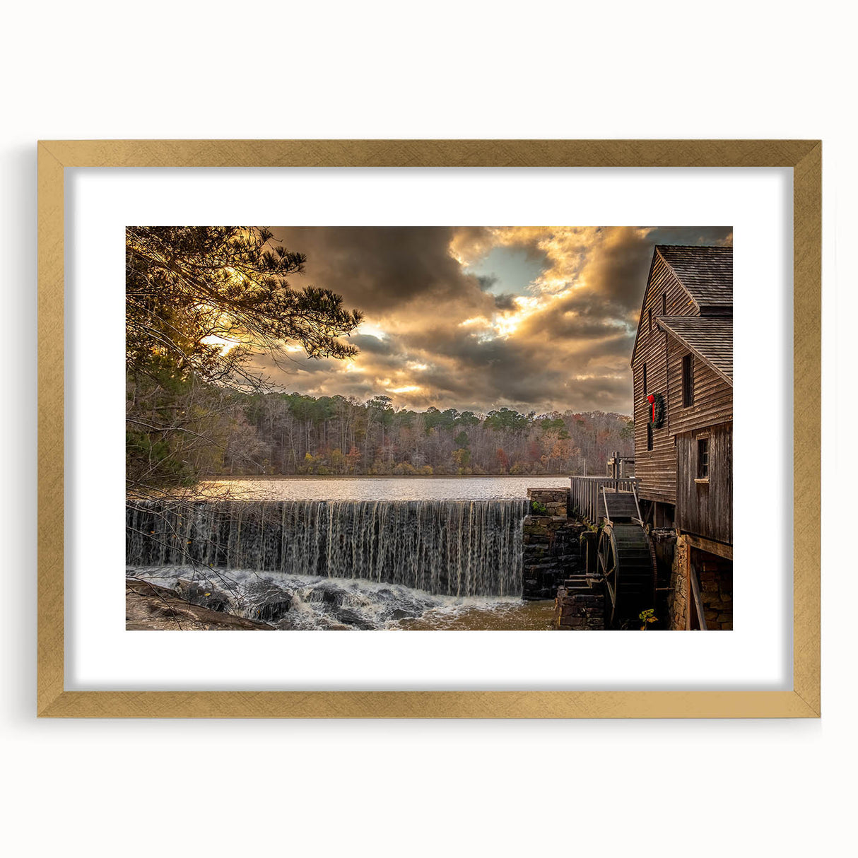 Extra large abstract art print of Raleigh skyline in muted gold and blue tones on a framed canvas.