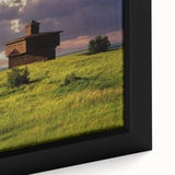 Black wall art featuring a textured North Dakota landscape on a large framed canvas, with colorful accents.